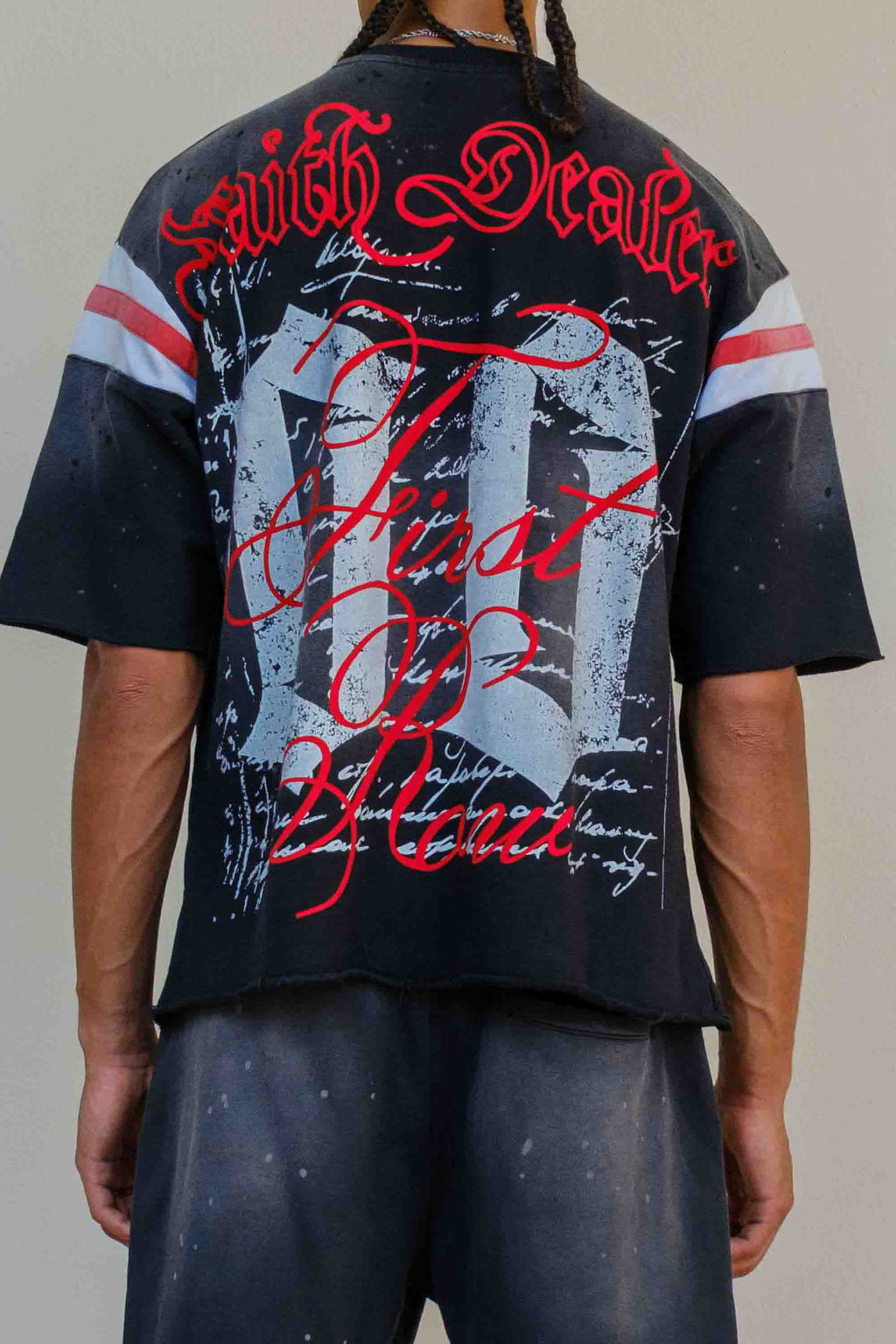 FAITH DEALER A SACRED VOW HALO VARSITY TEE