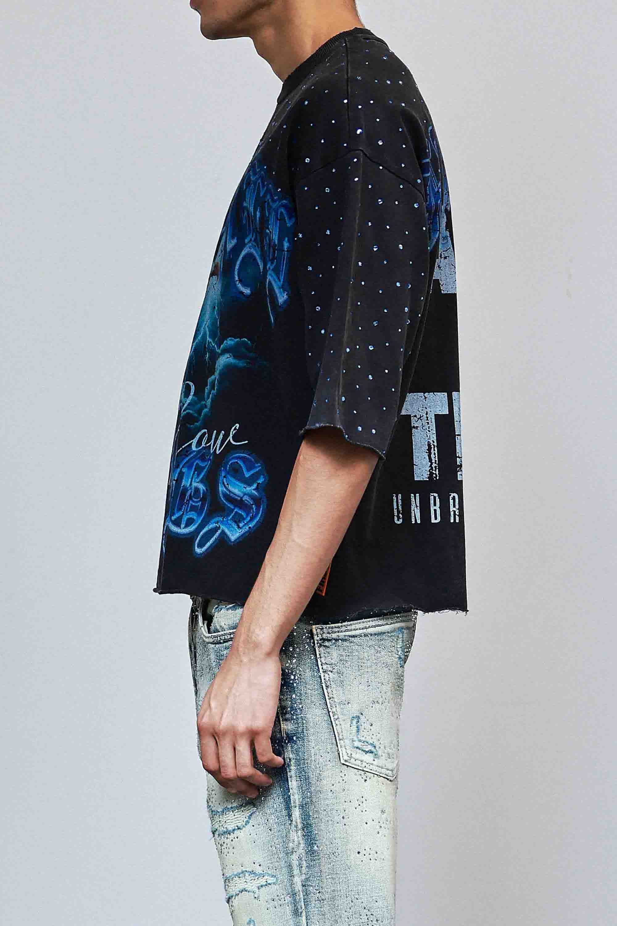 ABOVE ALL THINGS RIDE THE STORM CROPPED TEE