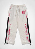 PROPERTY OF FIRST ROW TRACK PANTS