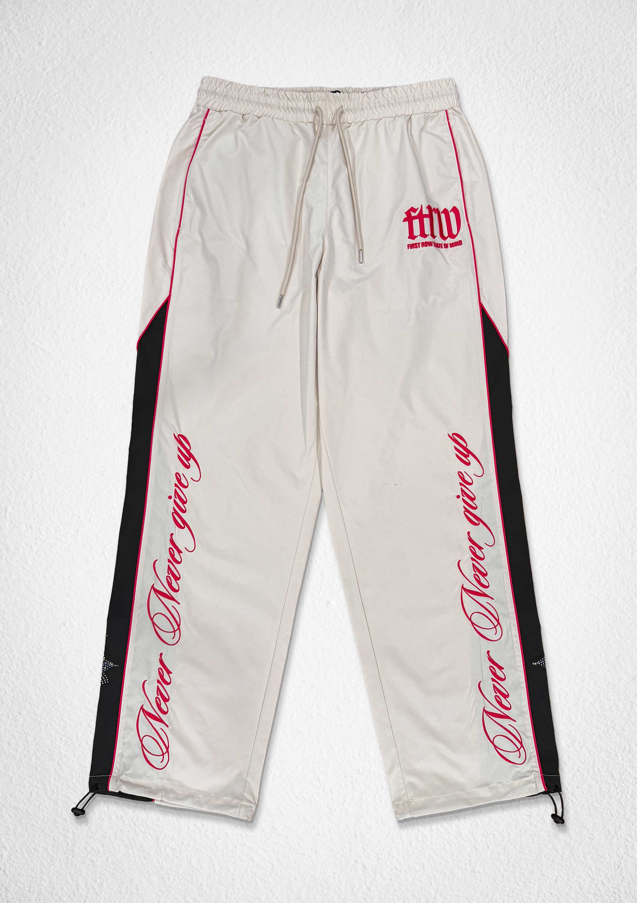 PROPERTY OF FIRST ROW TRACK PANTS