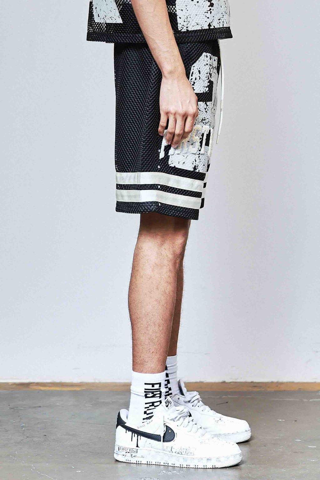 NEVER THE END FOOTBALL SHORTS
