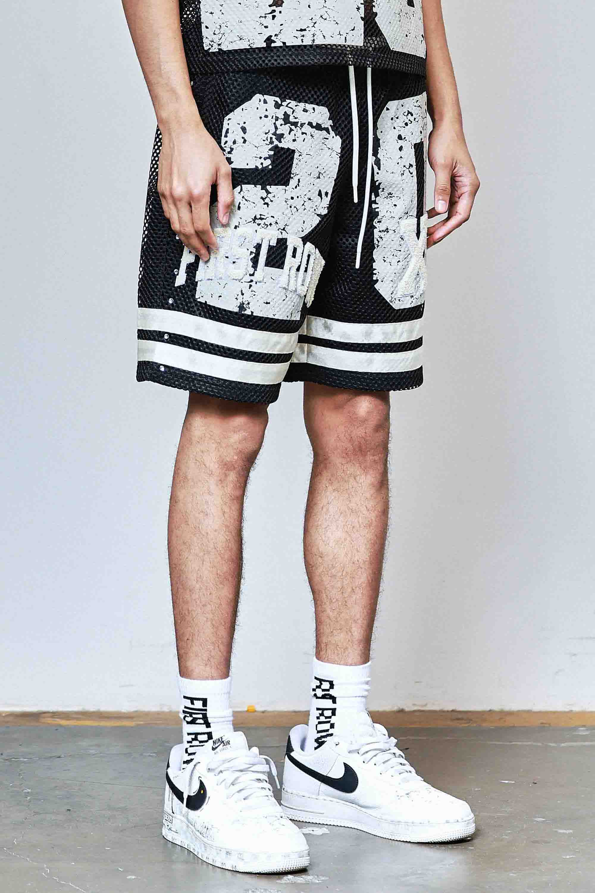 NEVER THE END FOOTBALL SHORTS