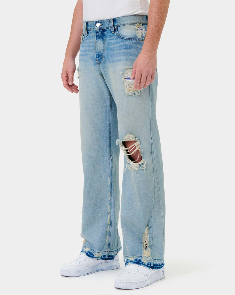 KNEE DESTROYED RELAXED FLARE DENIM