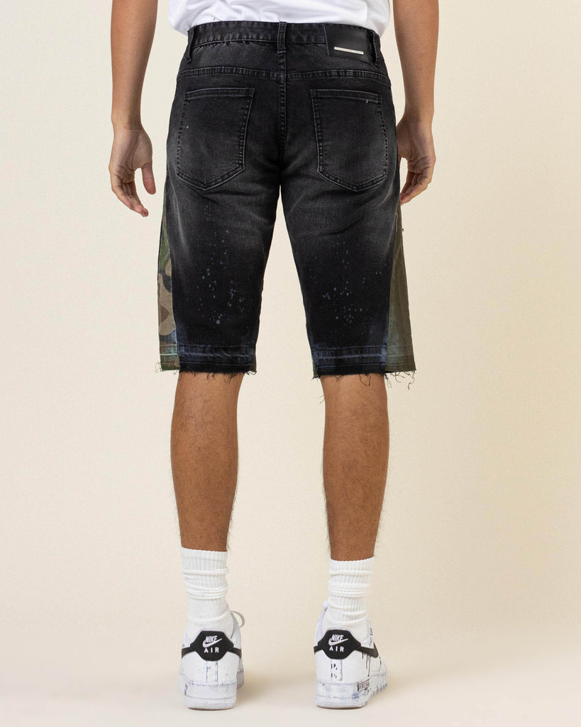 MULTI CAMO PANELED RELEASED HEM BLACK DENIM SHORTS