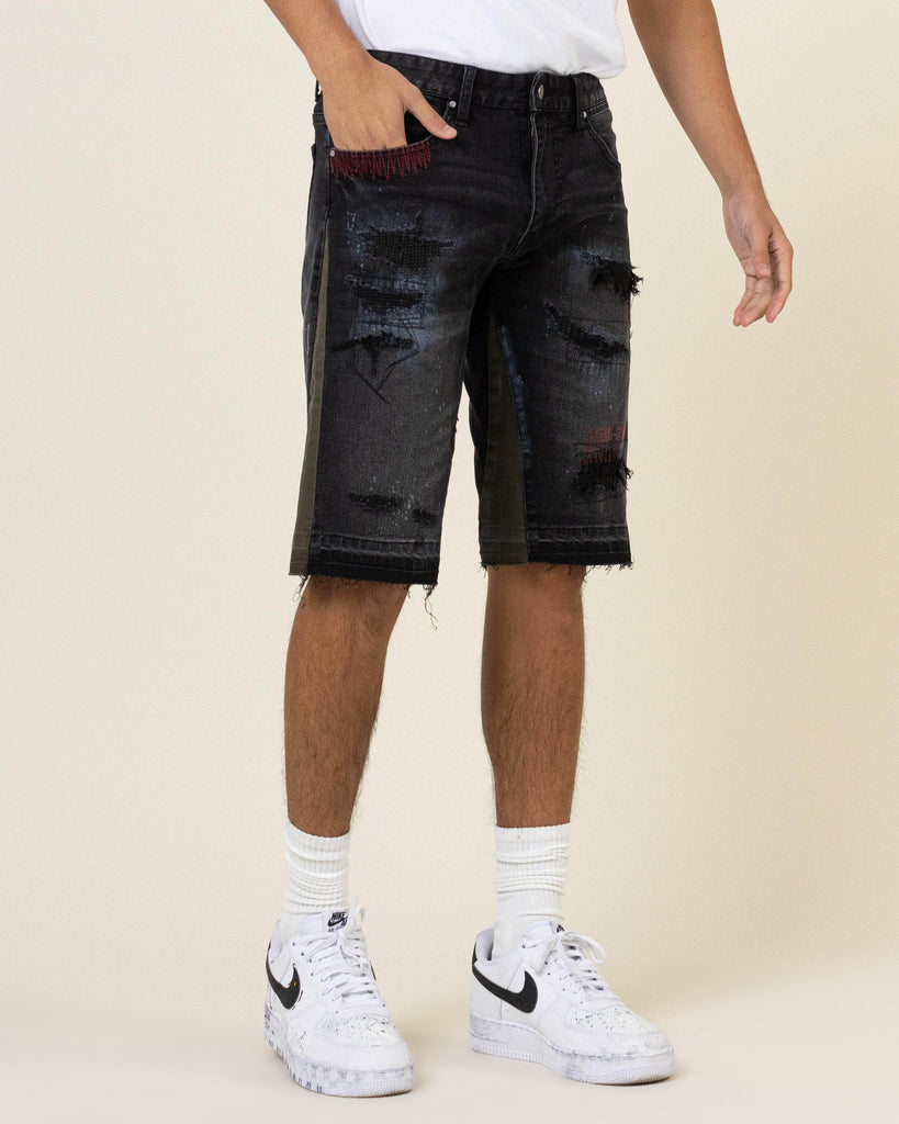 MULTI CAMO PANELED RELEASED HEM BLACK DENIM SHORTS