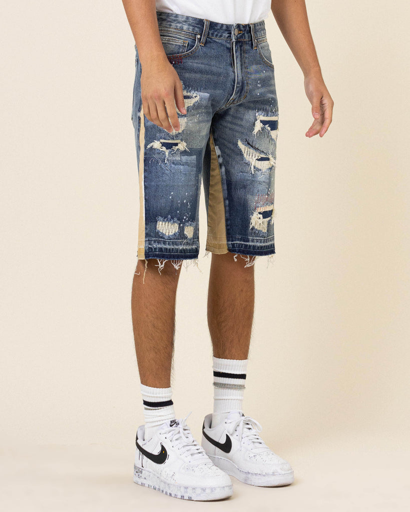 MULTI CAMO PANELED  RELEASED HEM DENIM SHORTS